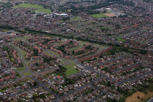 Grange Road, Bryn, with it's two roundabouts, the railway line leading up to Wigan Road, and Old Road, Ashton, with Cansfield High School, top right.