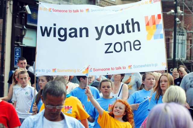 Young people enjoy being in the parade through Wigan town centre for the official opening of Wigan Youth Zone.