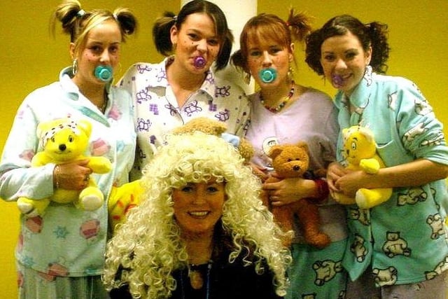 Wigan and Leigh College hairdressing students fund-raising for Children in Need. From left, Stephanie Barker, Rebecca Corns, Nicola Kedward and Kate McCaffrey with their tutor Andrea Shawcross
