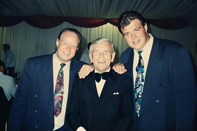 Vinny Cadman (left), his long time double act partner Clive Wills (right) with Sir Norman Wisdom