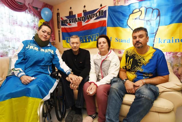 A reunited Ukrainian family talk about the past few months as Standish residents Svitlana Vordzhkina, left, and husband Ruslan Vordzkin, right, welcomed her father Sergii Shygimaga and step-mother Ganna Shygimaga, who fled the war in Ukraine earlier this year.