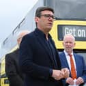 Mayor of Greater Manchester Andy Burnham, was joined by transport commissioner Vernon Everitt and leaders of Wigan Council and Bolton Council and a fleet of yellow Bee Buses ready for their launch earlier this year