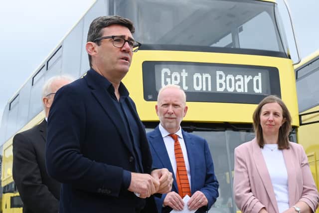 Mayor of Greater Manchester Andy Burnham, was joined by transport commissioner Vernon Everitt and leaders of Wigan Council and Bolton Council and a fleet of yellow Bee Buses ready for their launch earlier this year