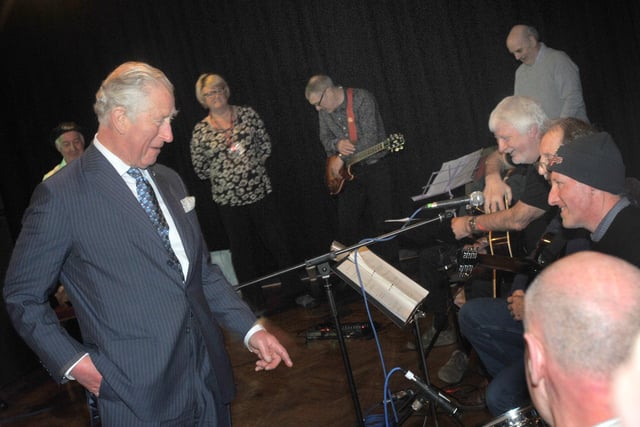 Prince Charles meets members of the Over-50's Jammers music group, and people from a variety of groups at The Old Courts, Wigan.