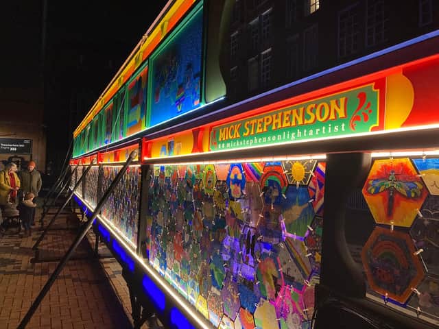 Children's artwork was included in this piece