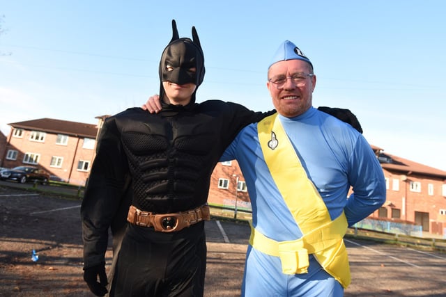 Batman and one of the Tracy brothers from Thunderbirds.