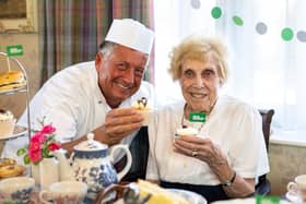 Chef Wayne Woolman and resident Joyce Wardle have been busy baking for Macmillan