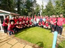 Wigan Warriors with the Derian House staff