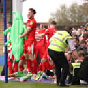 Callum Lang celebrates as Latics win promotion at Shrewsbury two seasons ago