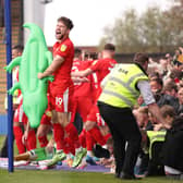 Callum Lang celebrates as Latics win promotion at Shrewsbury two seasons ago