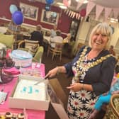 Mayor of Wigan, Coun Marie Morgan, cuts the cake