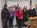 Left to right: Hanifah Ibrahim; Jean Hensey-Reynard; Olivia Marks-Woldman OBE; Hannah Lewis MBE; Karen Pollock CBE; Oliver Smith; and Peter Lee, director of Cabinet Office- Communities and Integration