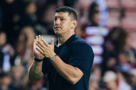 Matt Peet applauds the Wigan Warriors fans