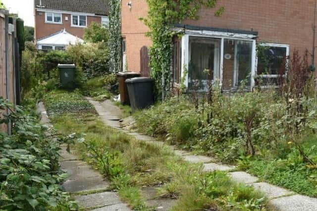 Among the instructions on the council notice were to repair and redecorate the porch and clear undergrowth from the garden