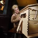 Shelley Wright with one of the beehives