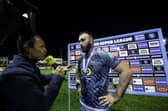Wigan's Kaide Ellis is interviewed after winning the Betfred Player of the Match award after victory over Castleford