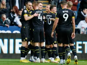 Will Keane takes the plaudits after opening the scoring at Swansea