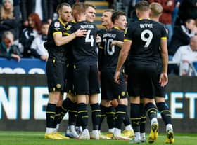 Will Keane takes the plaudits after opening the scoring at Swansea