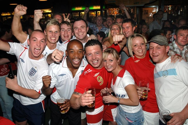 2006 - Fans in Walkabout enjoy the atmosphere before England went out of the World Cup on penalties to Portugal.
