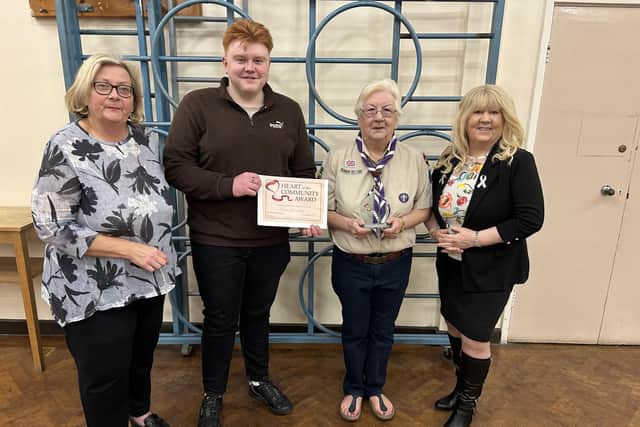 Joan Smith receives the Heart of the Community Award from councillors Mary Callaghan and Pat Draper and Labour's prospective candidate for Douglas ward, Matt Dawber