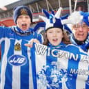 Joshua Peake, Olivia Howarth, Eric Jones and Callum Ward at the Carling Cup Final between Wigan Athletic and Manchester United at the Millennium Stadium, Cardiff, on Sunday 26th of February 2006.
