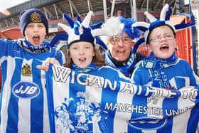 Joshua Peake, Olivia Howarth, Eric Jones and Callum Ward at the Carling Cup Final between Wigan Athletic and Manchester United at the Millennium Stadium, Cardiff, on Sunday 26th of February 2006.
