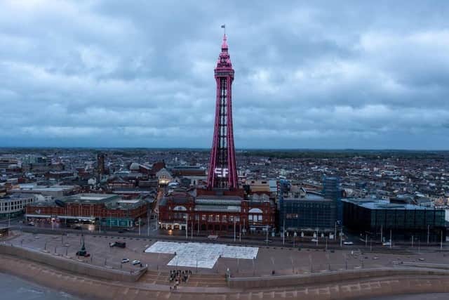 Blackpool Tower lit up pink for a gender reveal