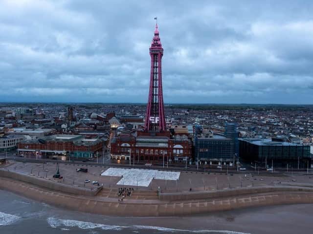 Blackpool Tower lit up pink for a gender reveal