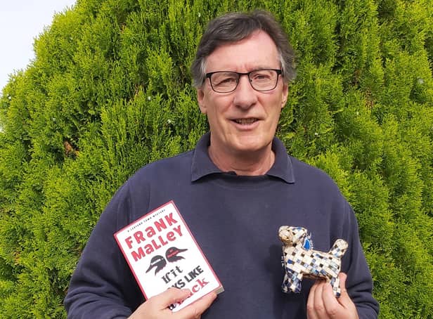 Frank Malley and his new release and dog made out of a cigarette box