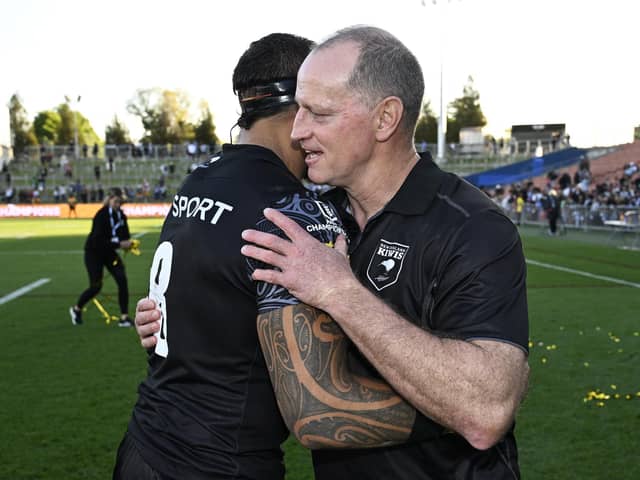 Michael Maguire coach of New Zealand embraces with captain James Fisher-Harris aftwer winning the Pacific Championships Cup Grand Final New Zealand v Australia