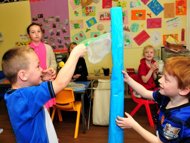 Catching paper butterflies in the Schoolies Room