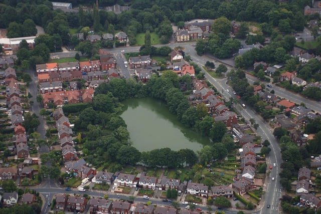 Whitley Reservoir, with St Clement's Road, left, Whitley Crescent, bottom, Spencer Road and Mesnes Road, right, converging at the Cherry Gardens Pub on Wigan Lane.