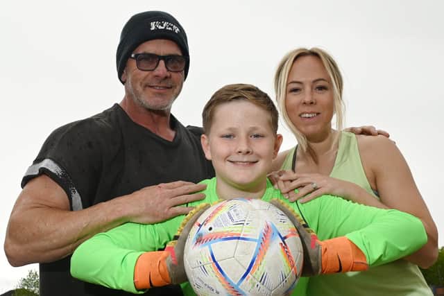 Larson Rushton, 11, pictured with proud parents Paul and Hayley Rushton from Standish.