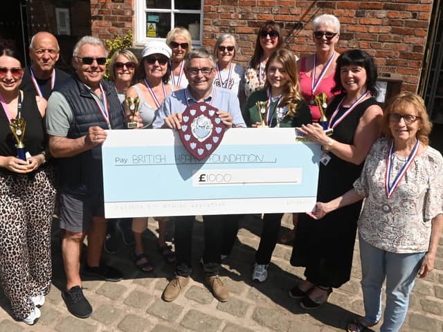 Members of the community who took part in the 400,000 step challenge in April, organised by Coun Chris Ready, for the British Heart Foundation and Wigan and Leigh Hospice