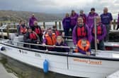 Craig Smart and family with Cllr Chris Ready and Inclusion Champions from Happy Smiles CIC onboard Wheely Smart