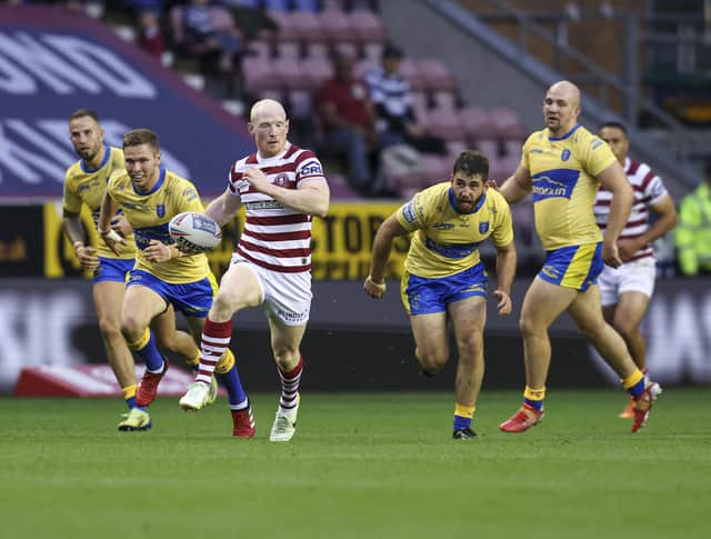 Wigan Warriors have named their 21-man squad to face Warrington Wolves