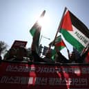 Protesters gather in support of the Palestinian people during a rally for Gaza in Seoul, South Korea