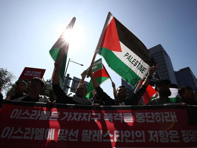 Protesters gather in support of the Palestinian people during a rally for Gaza in Seoul, South Korea