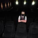 Staff at Wigan's Empire Cinema welcoming back customers after Covid-19 restrictions in May 2021