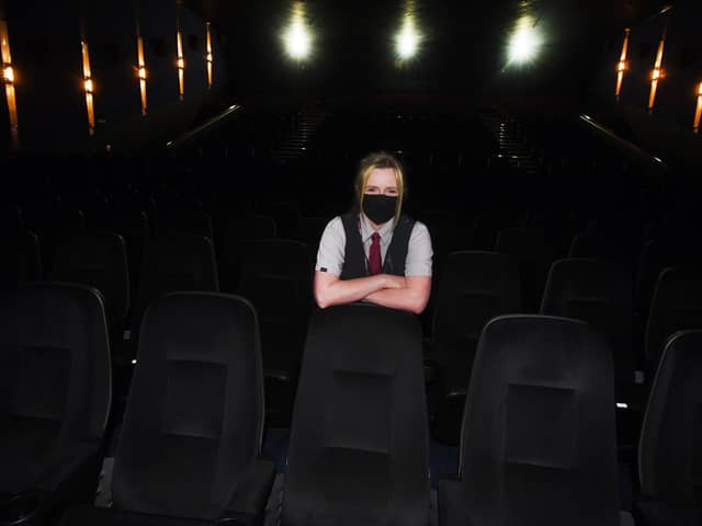Staff at Wigan's Empire Cinema welcoming back customers after Covid-19 restrictions in May 2021