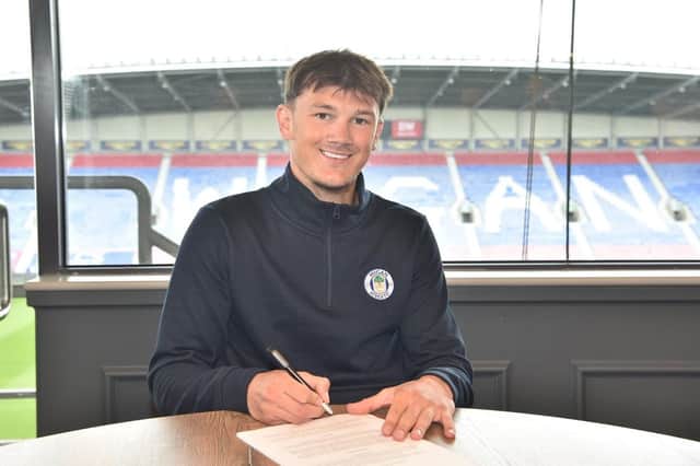 Calvin Ramsay puts pen to pay with Wigan Athletic