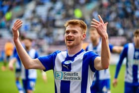 Luke Robinson celebrates his winning goal against Cambridge