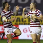 Wigan Warriors take on Warrington Wolves at the DW Stadium