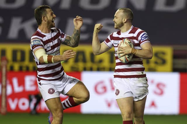Wigan Warriors take on Warrington Wolves at the DW Stadium