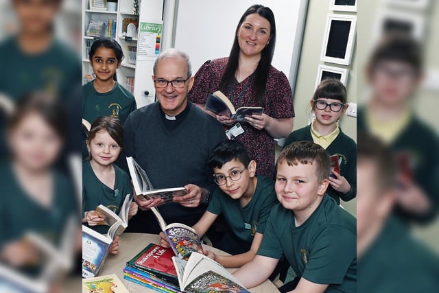 Among the guests to celebrate the library opening was Father Joseph, the Parish Priest, who blessed the library on its opening and the class librarians from each year group.