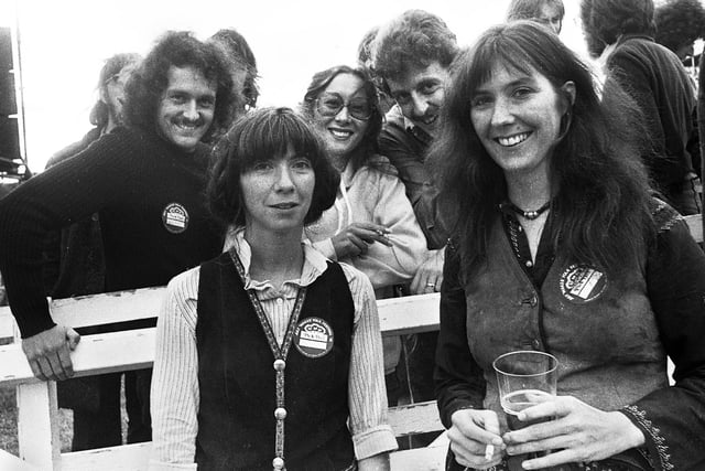 Canadian singers Anna, left, and Kate McGarrigle with fans at the July Wakes Folk Festival at Park Hall, Charnock Richard, on Saturday 24th of July 1976.