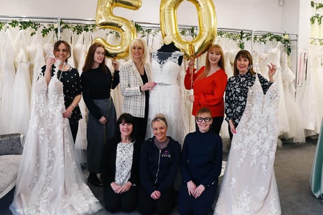 The team at Creation Weddings, Market Street, Wigan, celebrate 50 years in business.