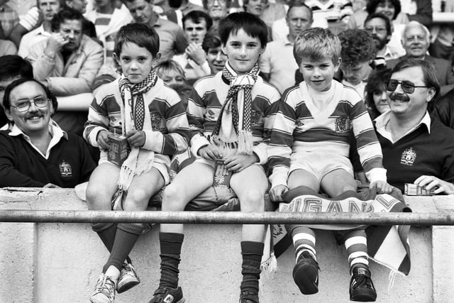 Home fans enjoying the league match against Hull which Wigan won 38-4 at Central Park on Sunday 30th of August 1987.
