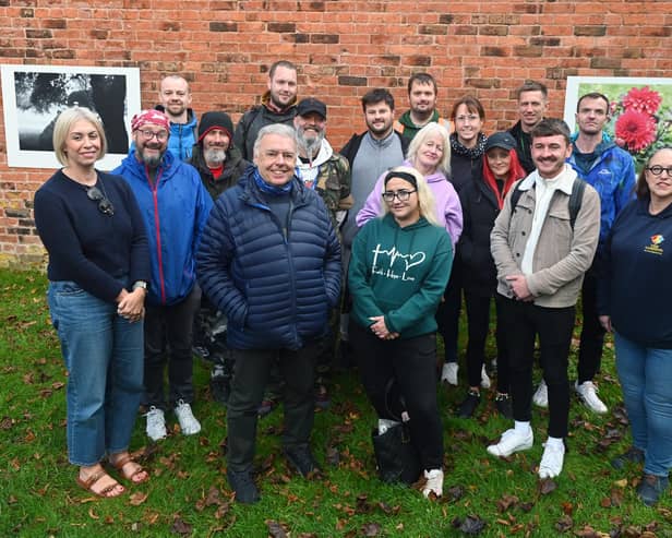 Some of the photographers and supporters at the outdoor exhibition, Eye of the Beholder - a photographic exhibition around the Walled Garden at Haigh Woodland Park.