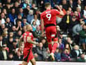 Charlie Wyke celebrates scoring his and Latics' second goal at Derby